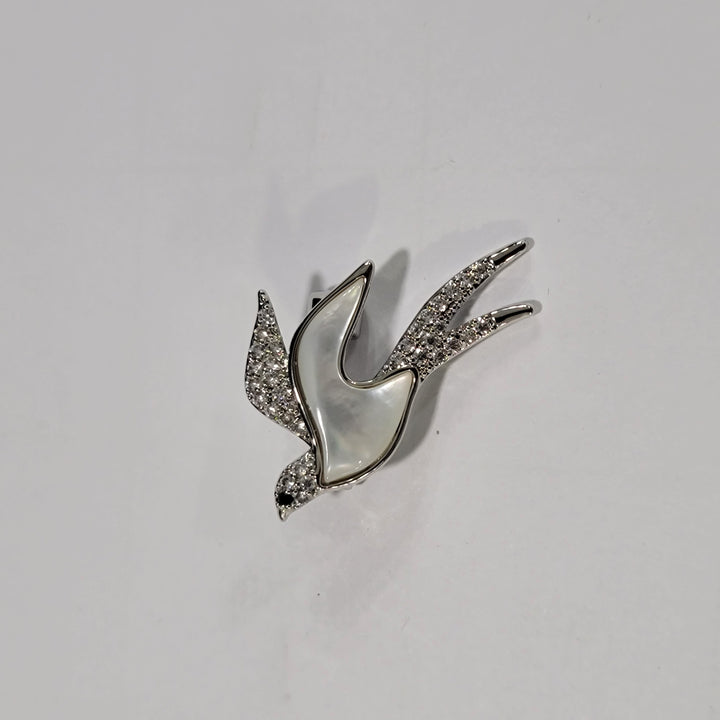 FLYING BROOCH
