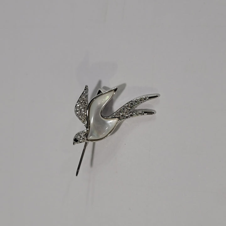 FLYING BROOCH